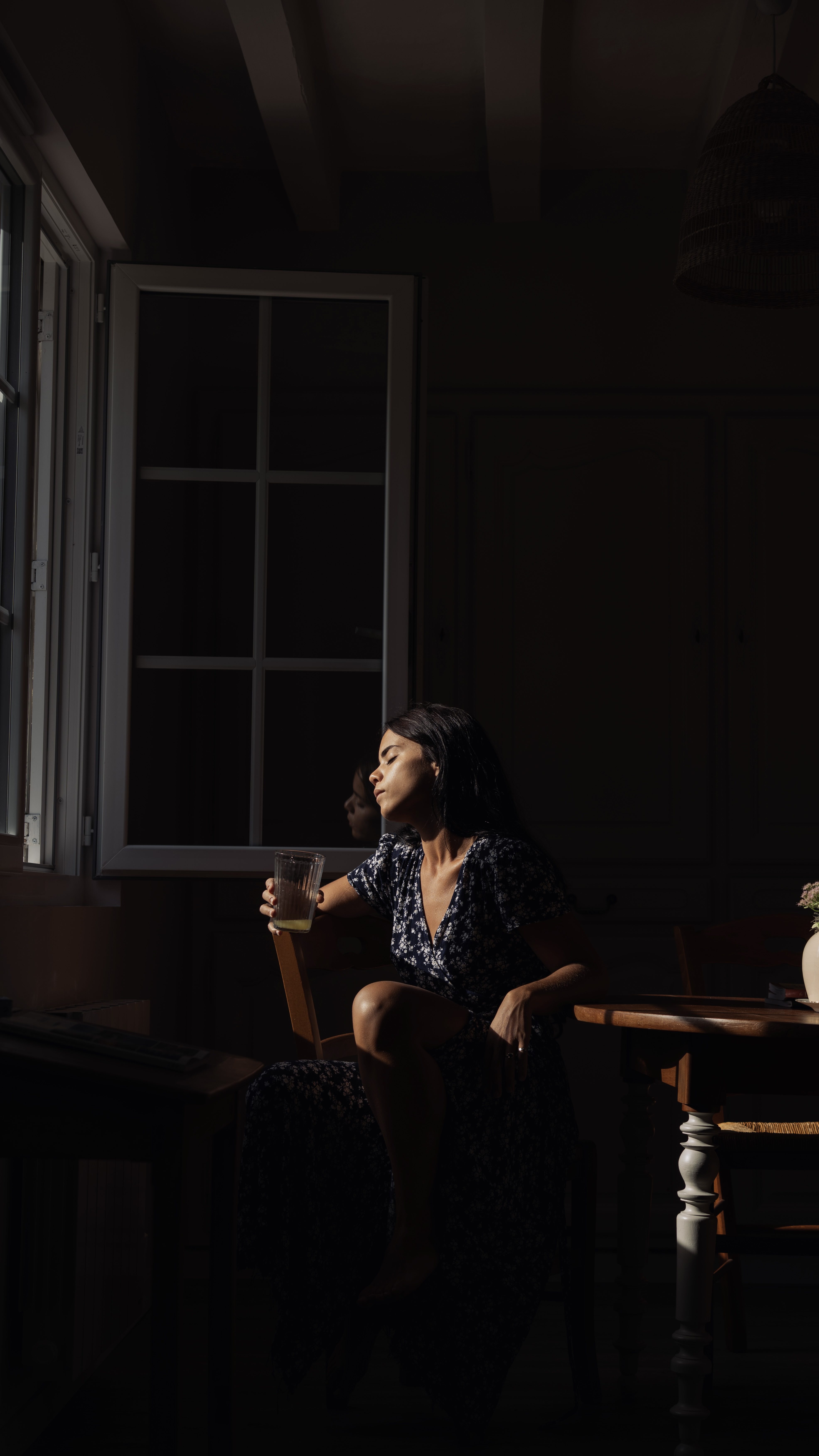 a beautiful woman enjoys the summer light