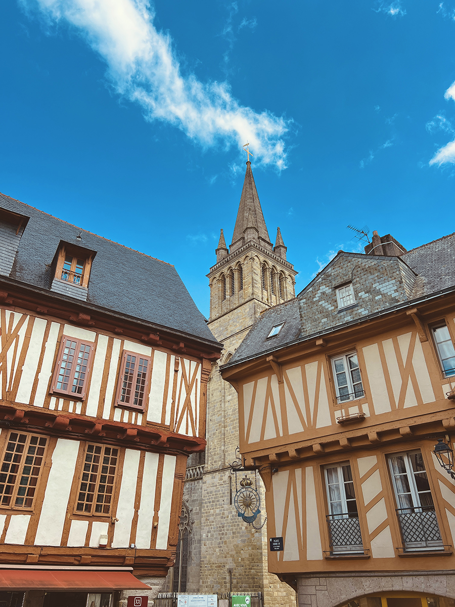 Historic old buildings under a clear blue sky in Vannes, Brittany — picturesque French townscape perfect for travel and culture lovers